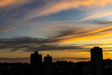 Plakat Silhouette of cityscaper buildings during a sunset in Brazil