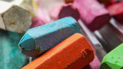 Macro blur photo of colorful crayon objects