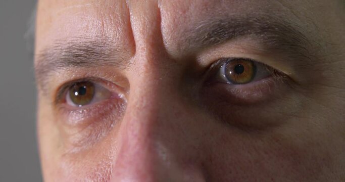 Close up of a Mans Eyes with a Slight Squint of Uncertainty