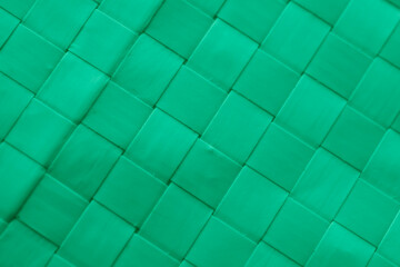Fototapeta na wymiar green jute sack background, closeup on the fibers