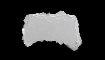 a white piece of paper on a black isolated background