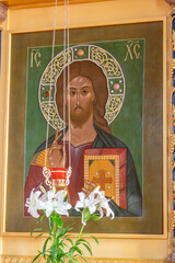 SHYMKENT, KAZAKHSTAN - JANUARY 24, 2023: ancient icon of jesus christ in the temple of Our Lady of Kazan