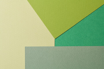 Rough kraft paper background, paper texture different shades of green. Mockup with copy space for text