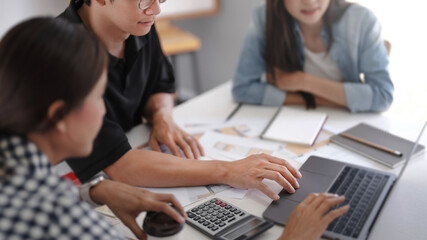 Fototapeta premium Asian Architects designer team working together meeting in startup office