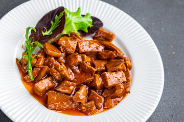 squid tomato sauce seafood salad meal aperitif food snack on the table copy space food background rustic top view