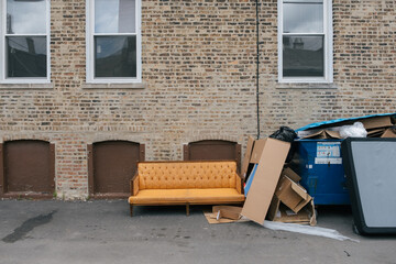 Couch by Dumpster