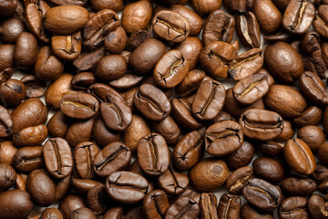 Fototapeta premium Coffee beans background. Conceptual abstract illustration with lots of coffee beans. Generative AI