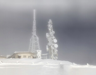 tv transmitter station in the snow