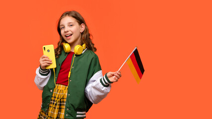 Girl holds small German flag