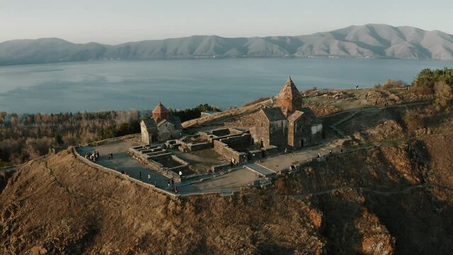 Aerial drone view of Sevanavank monastic complex on a peninsula at the northwestern shore of Lake Sevan