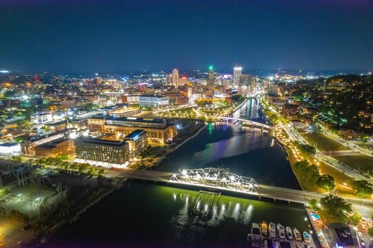 Aerial view of cityscape Providence surrounded by buildings in night © Noah Hairston/Wirestock Creators