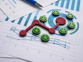 Graphs and curve. Emoticons as a symbol of positive feedback.