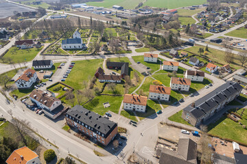 Aerial view on a little town in Europe, Sweden. Low-rise residential buildings and private houses. Landscape architecture, urbanism. Comfortable city for living. Design concept. A little village. 