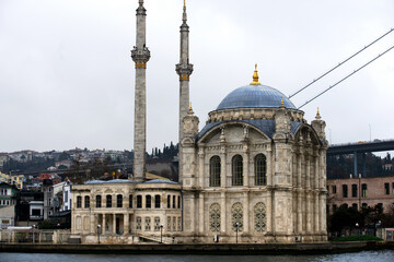 Fototapeta na wymiar River view of the Ortakoy Mosque by the Bosphorus bridge, in Istanbul.