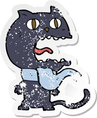 retro distressed sticker of a cartoon frightened cat