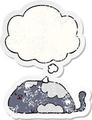 cartoon cat and thought bubble as a distressed worn sticker