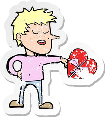 retro distressed sticker of a cartoon man with valentine gift