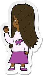 sticker of a cartoon girl with pony shirt waving
