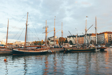 Wide look of huge wind boats with ropes on finish seaport 