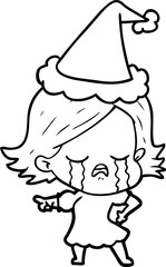 line drawing of a girl crying and pointing wearing santa hat