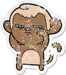 distressed sticker of a cartoon annoyed monkey