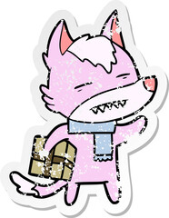 distressed sticker of a cartoon wolf with a gift