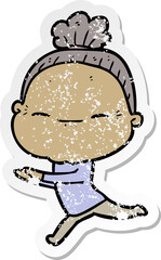 distressed sticker of a cartoon peaceful old woman