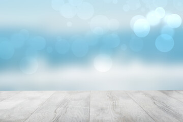 Empty wooden table over abstract blurred natural cloudy blue sky background. Space for your food...