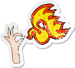 retro distressed sticker of a cartoon hand and fire symbol