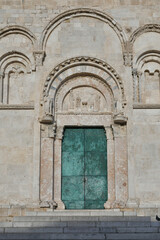 Fototapeta na wymiar The door of the cathedral of Termoli, a medieval town in the province of Campobasso in Italy.