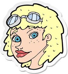 sticker of a cartoon happy woman wearing aviator goggles