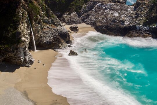 Water fall flowing into the ocean