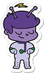 sticker of a friendly cartoon spaceman