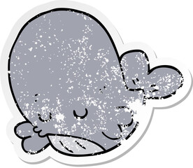 distressed sticker of a cartoon whale