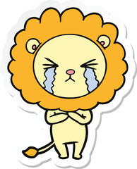 sticker of a cartoon crying lion