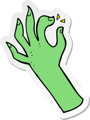 sticker of a cartoon hand symbol
