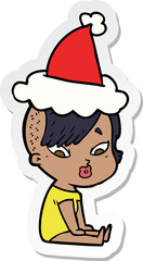 sticker cartoon of a surprised girl wearing santa hat