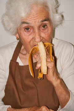Grandma eating a banana