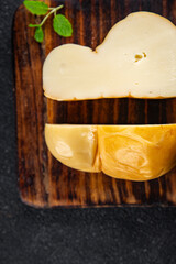 cheese scamorza smoked flavor fresh food snack on the table copy space food background rustic top view