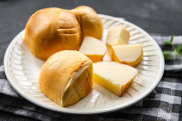 cheese scamorza smoked flavor fresh food snack on the table copy space food background rustic top view