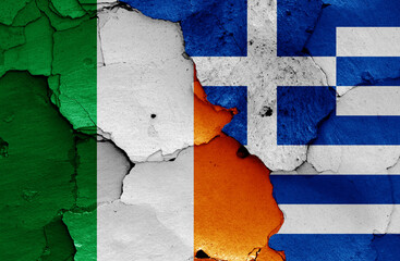 flags of Ireland and Greece painted on cracked wall