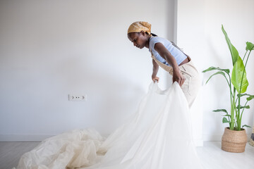 Black woman starting renovation at home