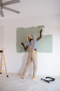 African American woman doing home remodeling