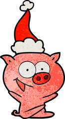 cheerful sitting pig textured cartoon of a wearing santa hat