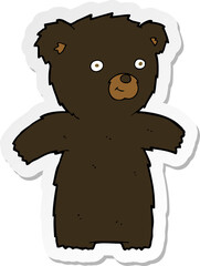 sticker of a cute cartoon black bear