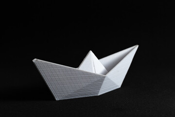 Fototapeta na wymiar plastic white boat like a paper boat
