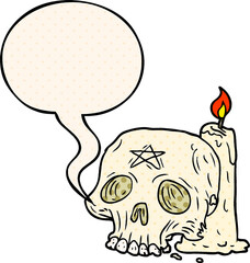 cartoon spooky skull and candle and speech bubble in comic book style