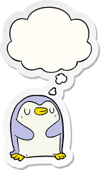 cartoon penguin and thought bubble as a printed sticker