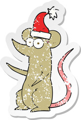 retro distressed sticker of a cartoon mouse wearing christmas hat