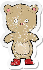 retro distressed sticker of a cartoon teddy bear